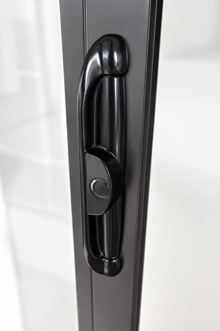 Before — Black lever-style sliding door handle